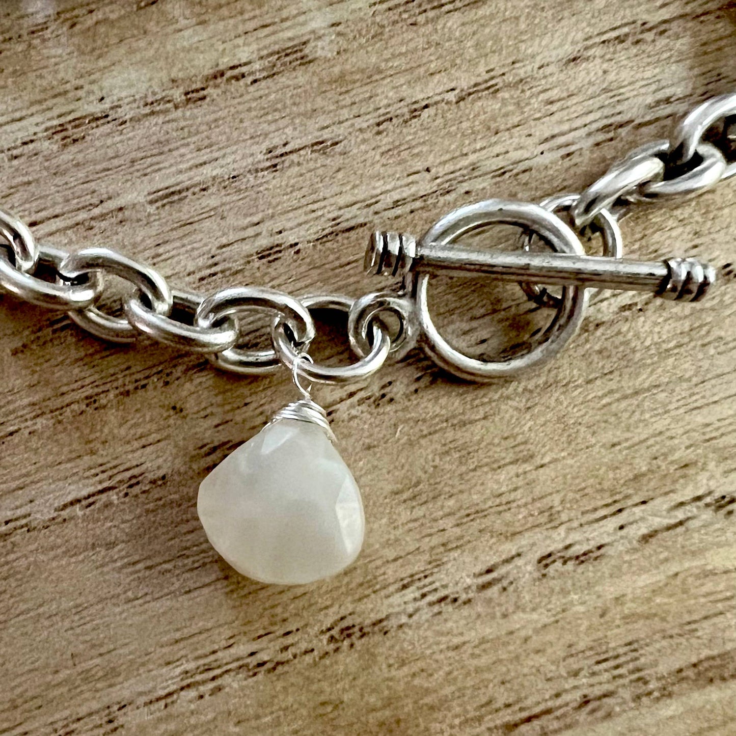 Heavy On The Bevys- traditional silver charm bracelet