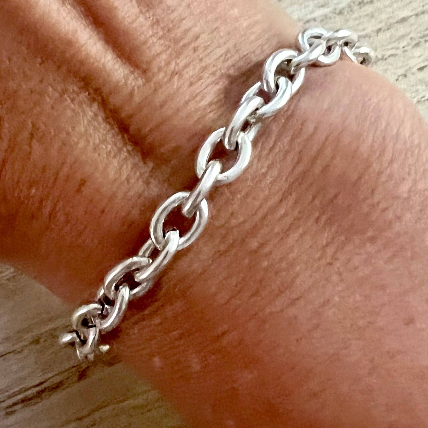 Heavy On The Bevys- traditional silver charm bracelet