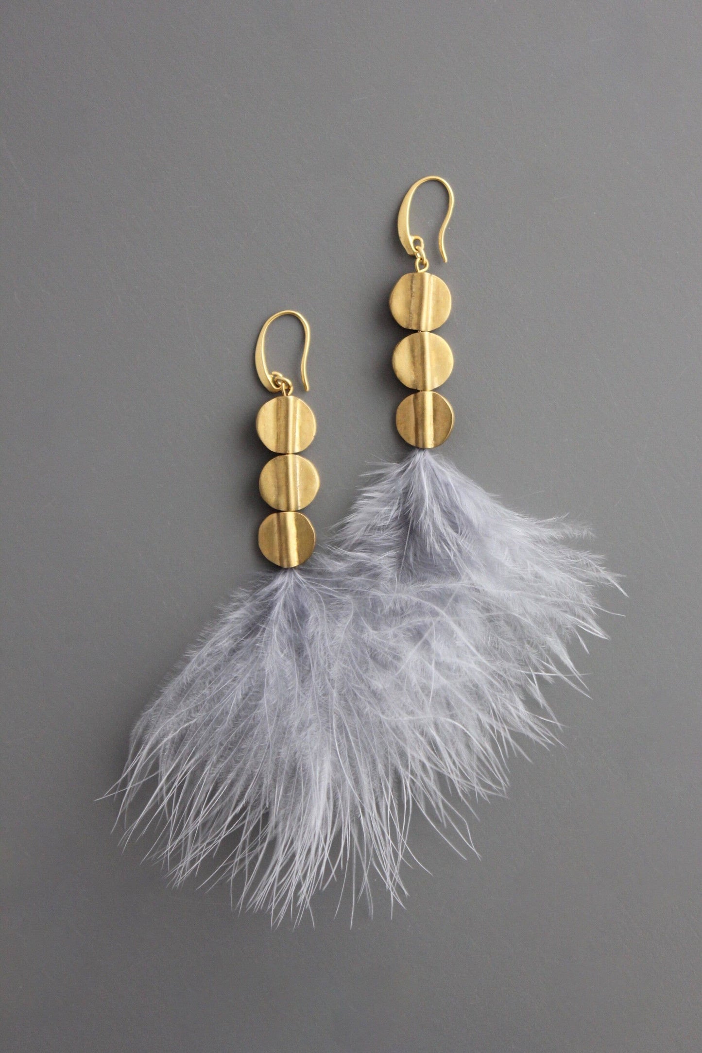 Lavender feathers and brass disc earrings