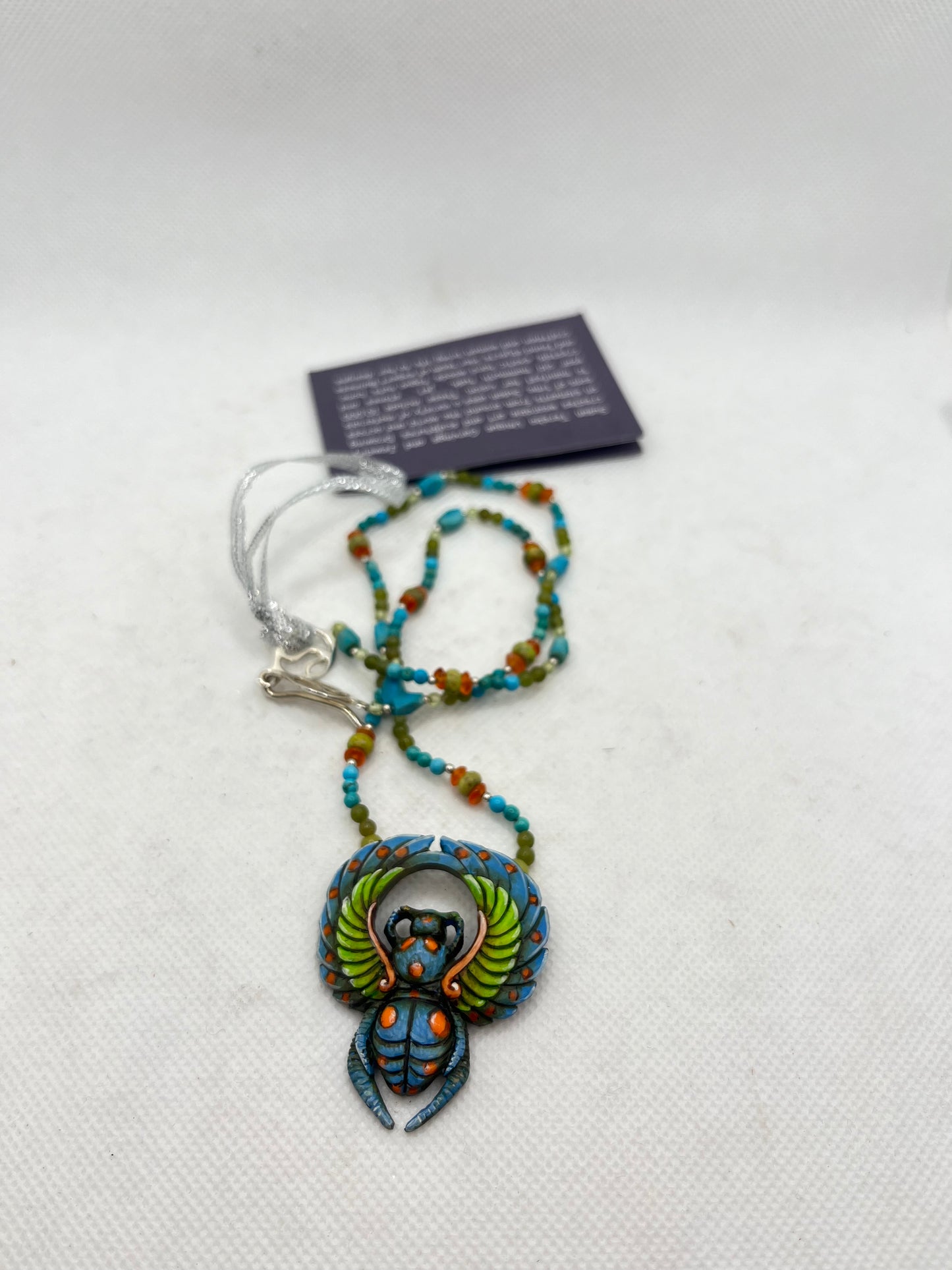A Scarab Takes Flight Necklace