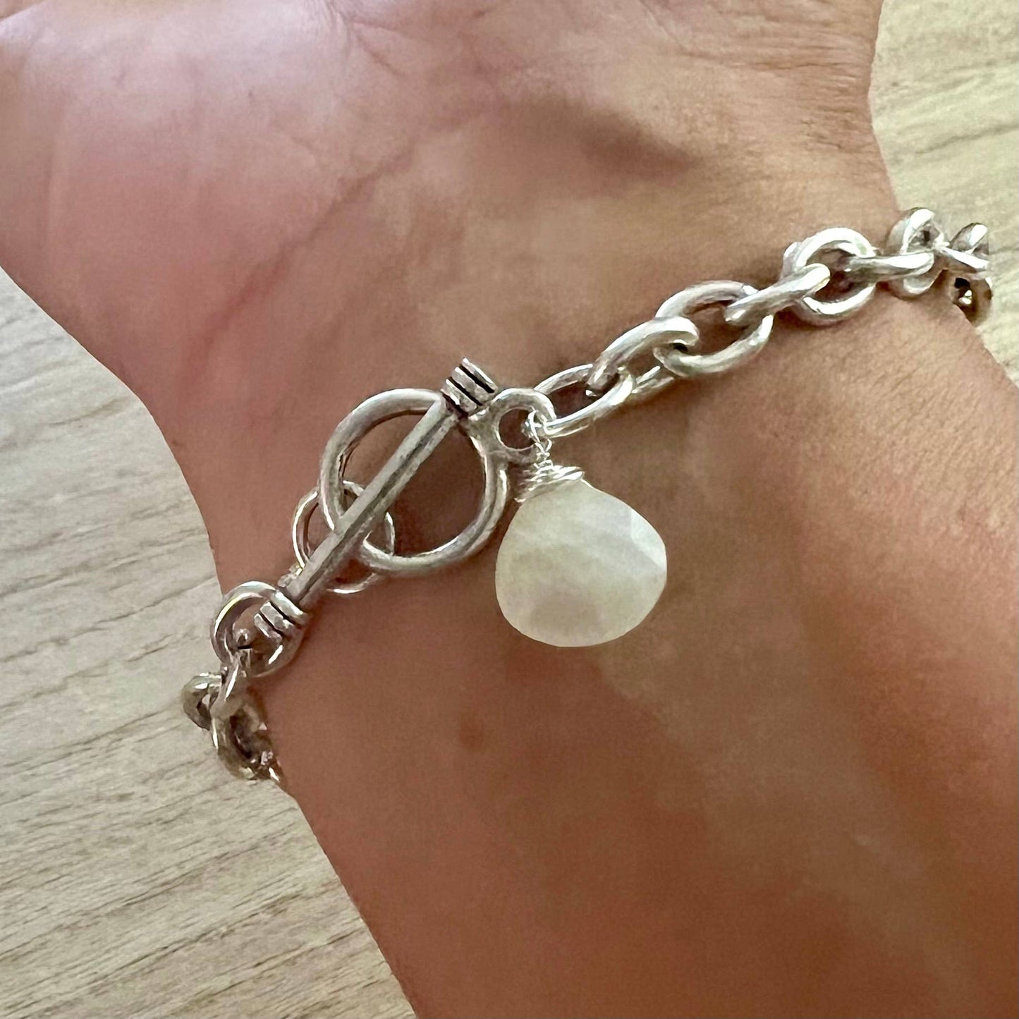 Heavy On The Bevys- traditional silver charm bracelet