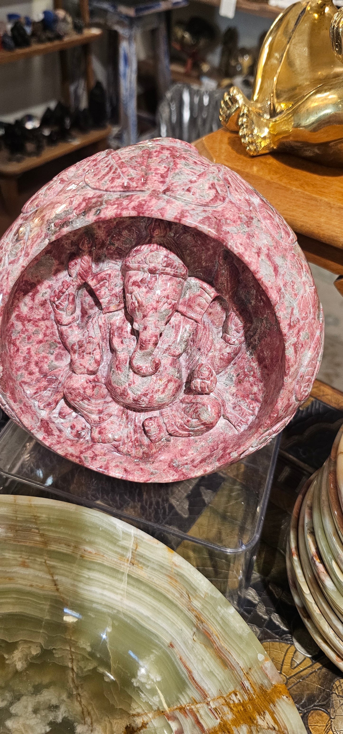 Thulite Ganesha in a cave with Intricate designs and symbols