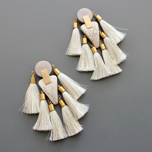 Gray and white tassel post statement earrings