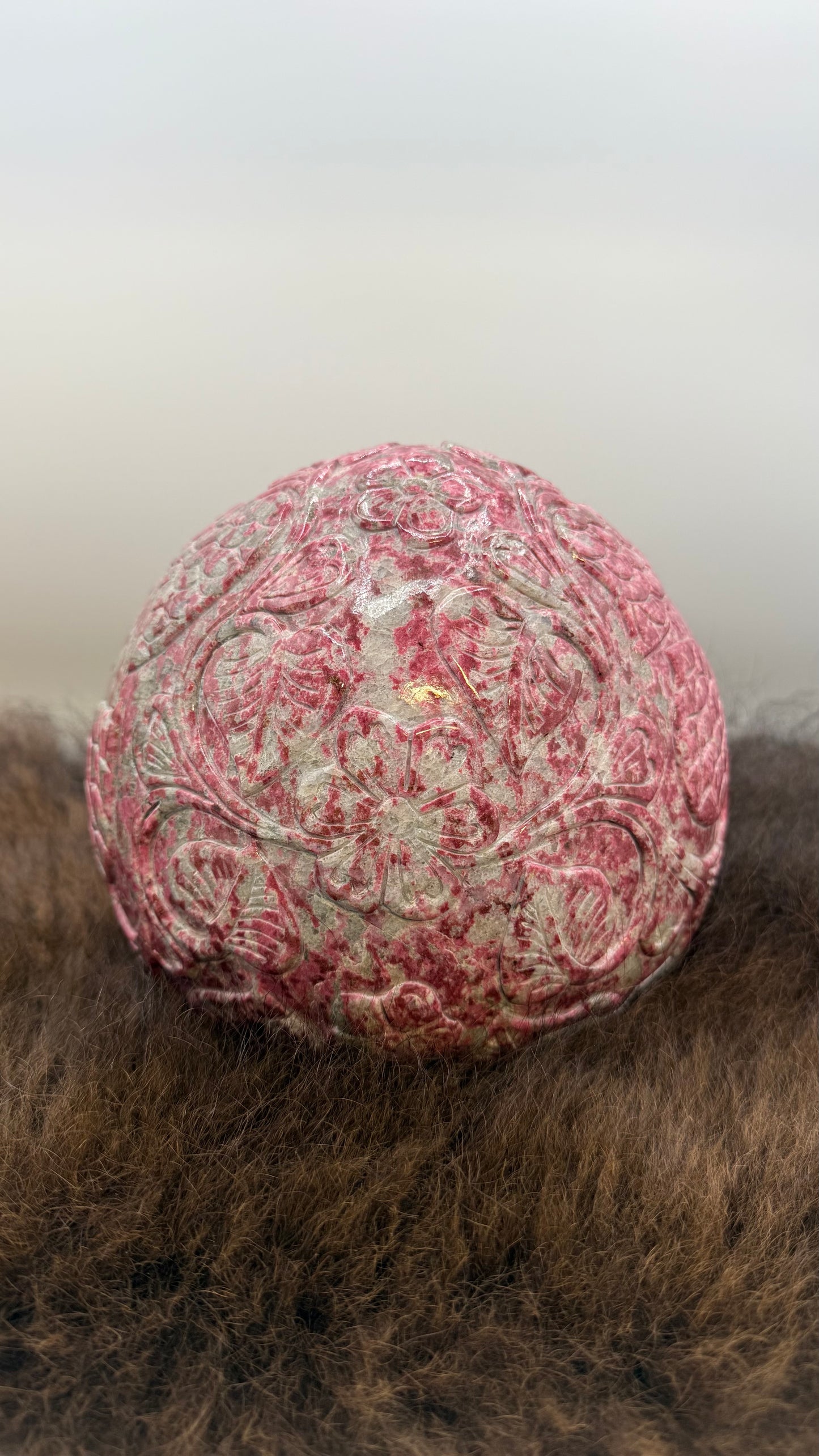 Thulite Ganesha in a cave with Intricate designs and symbols