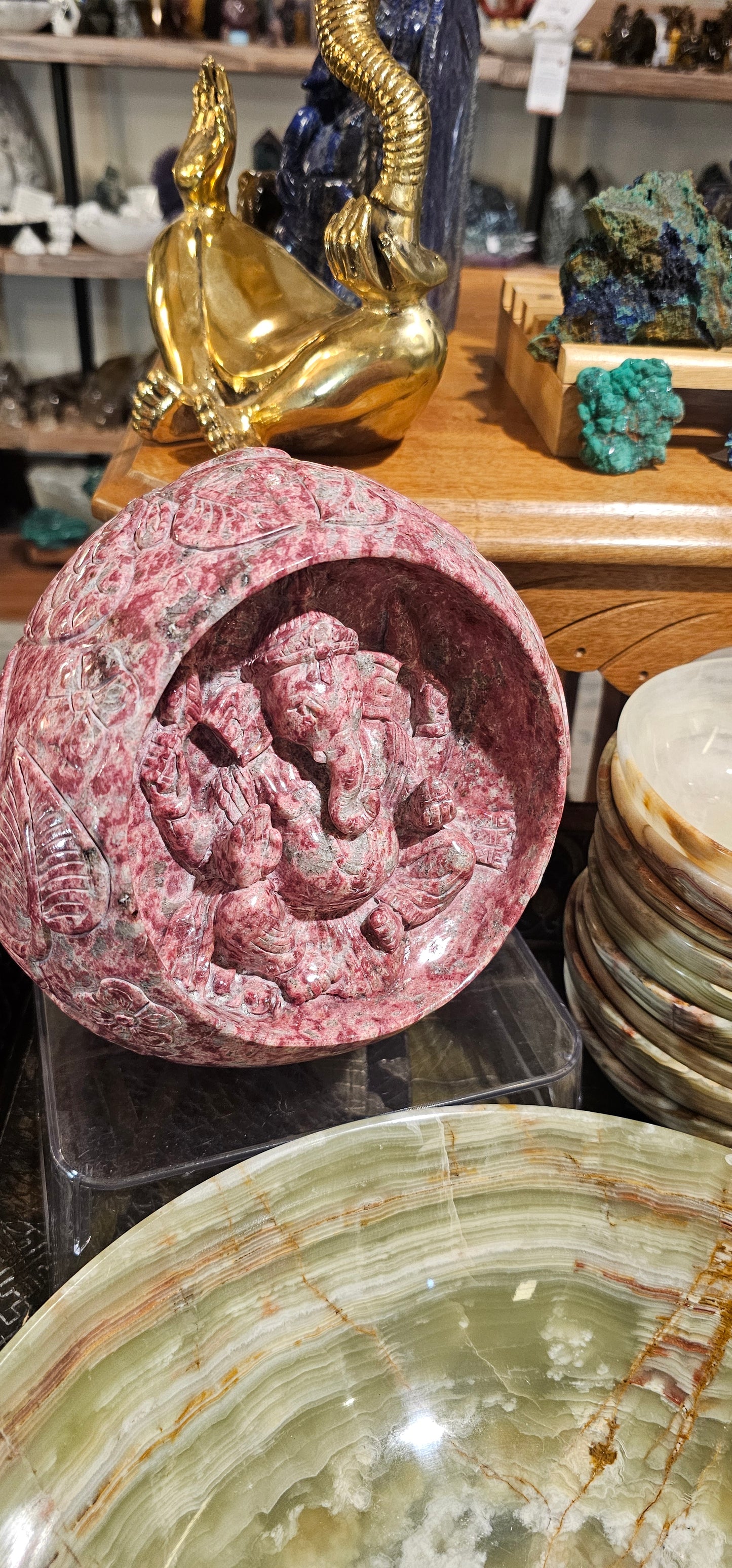 Thulite Ganesha in a cave with Intricate designs and symbols