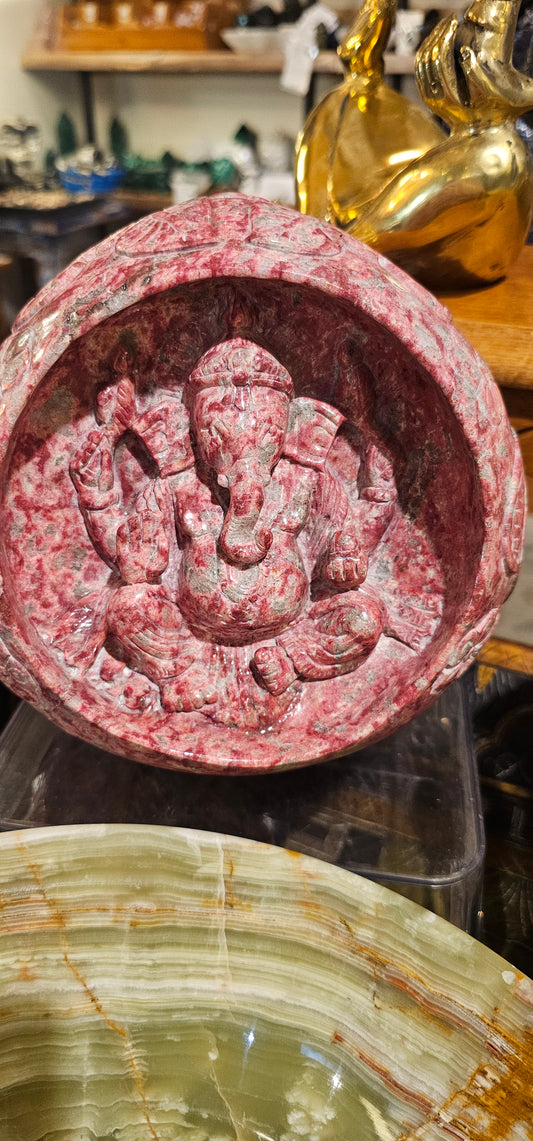 Thulite Ganesha in a cave with Intricate designs and symbols